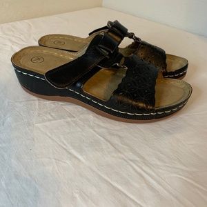 Black Slip on Sandals with adjustable velcro top straps.  Size 7.  **NEW**